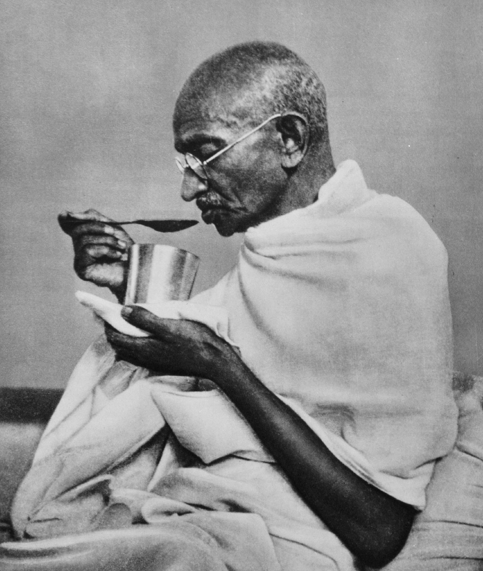 Mahatma Gandhi eats in preparation for a fast, c. 1940. Dutch National Archives (CC0).