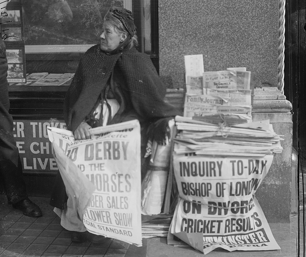 Newspaper seller, London, 1900. George Grantham Bain Collection.